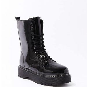 Black patent leather combat boot